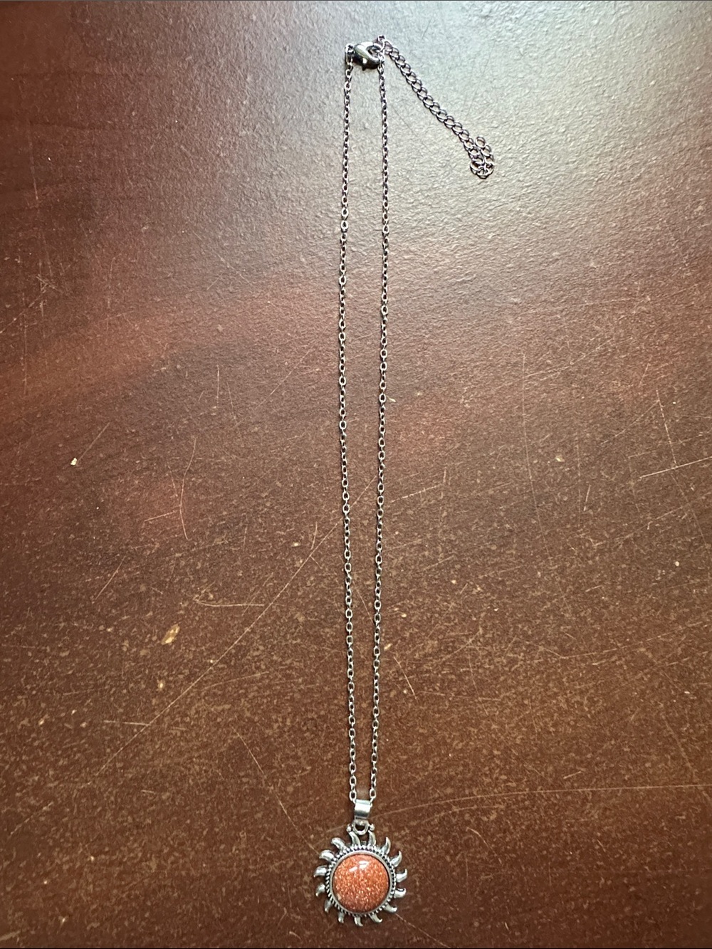 Sunburst Silver Necklace with Orange Stone Pendant